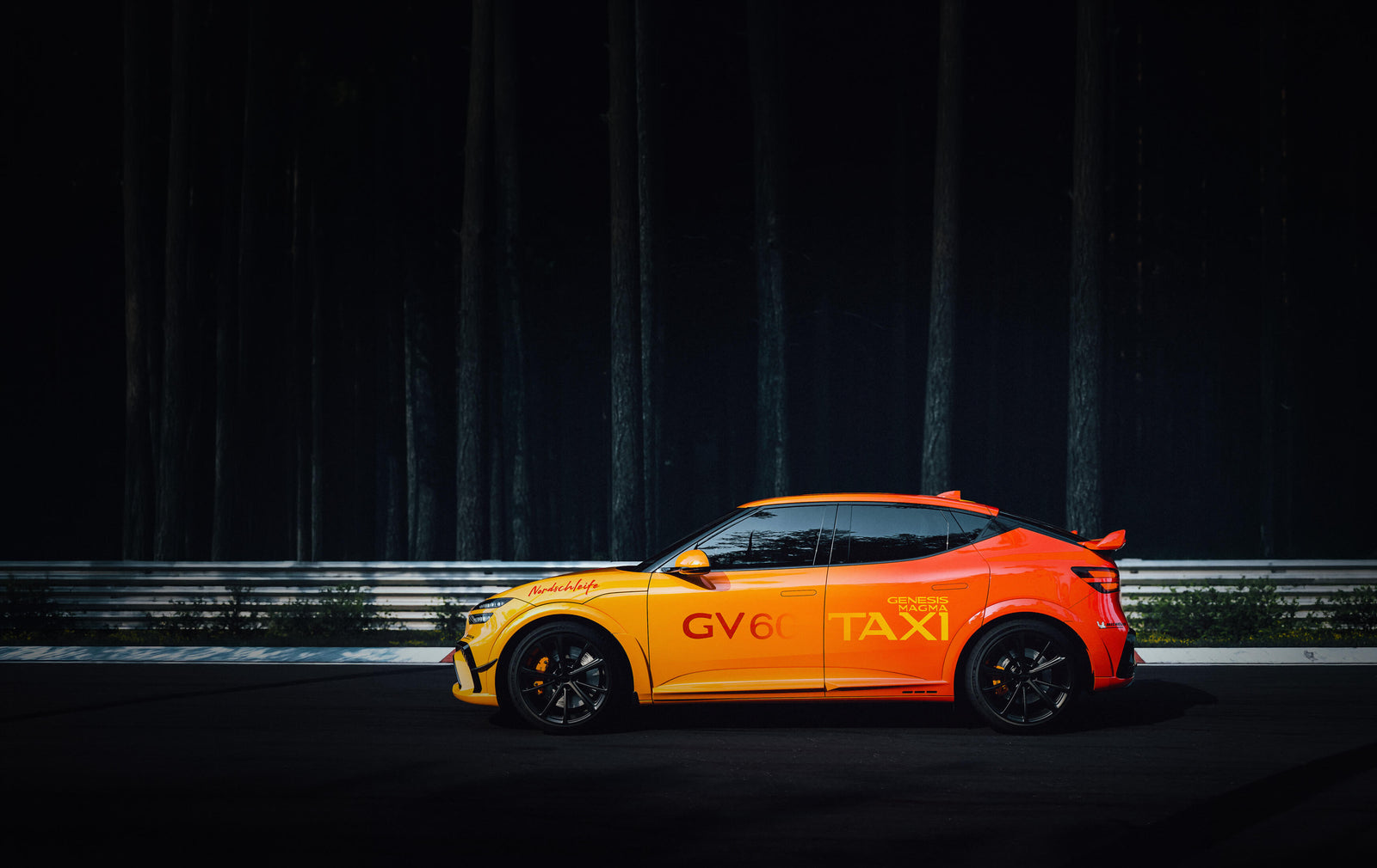 Genesis GV60 Magma Track Taxi